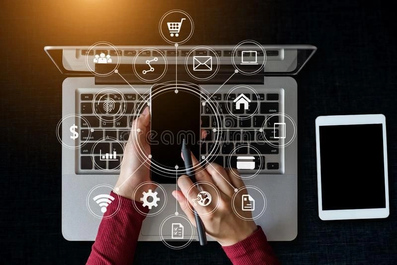 A freelance digital marketing analyst in Malappuram using a phone and laptop with SMM icons.