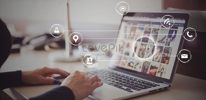 A freelance digital marketing analyst in Malappuram working on a laptop, with hands on the keyboard digital icons representing content marketing.
